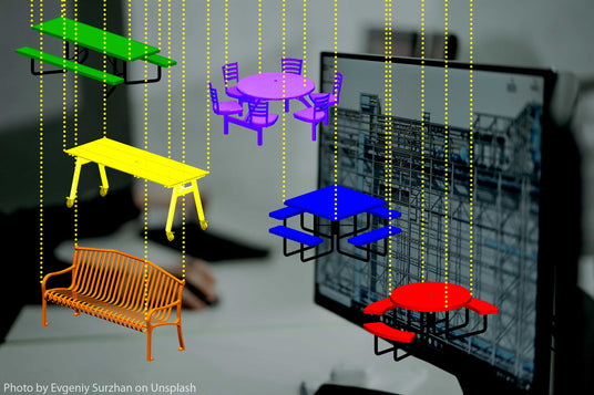 a BIM screen on a computer with colorful Revit files drifting into the frame